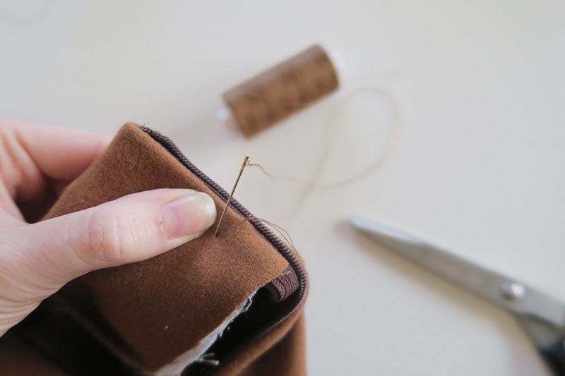 Pinch waistband together