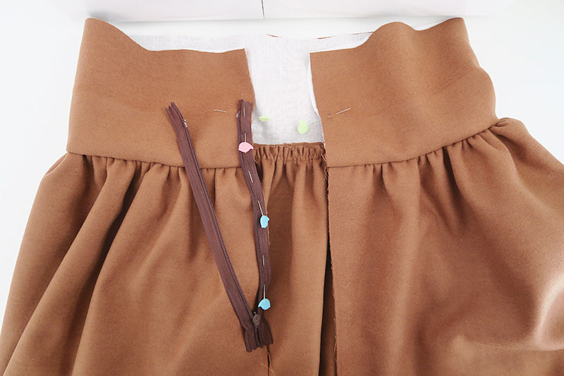 Place zip on left-hand side of skirt opening