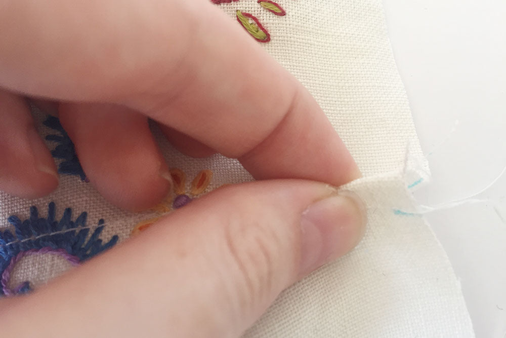 Pinch fabric between the lines