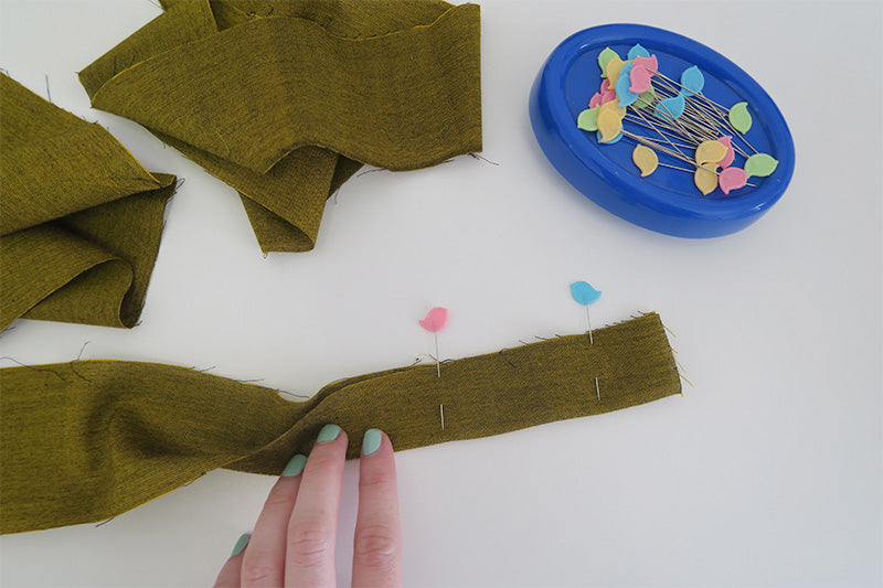 Fold belt lengthwise