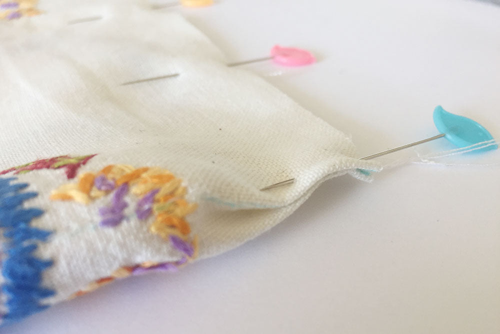 Pin the fold to form the base