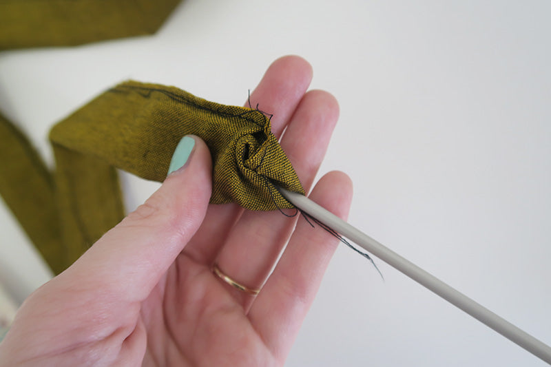 Turn right side out with a knitting needle