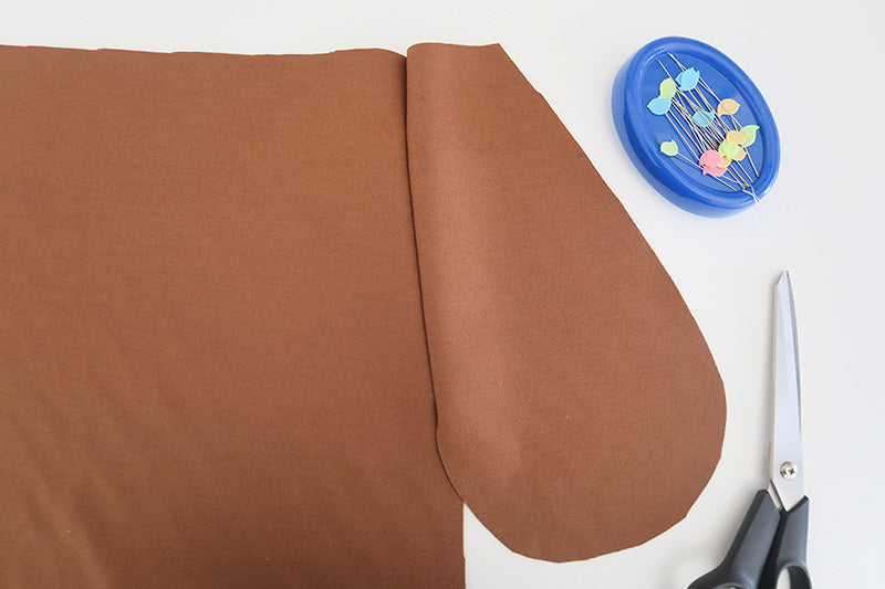 Flip the pocket out to the side