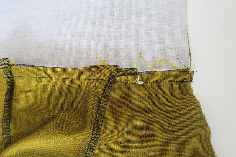 Press seam allowances up onto waistband