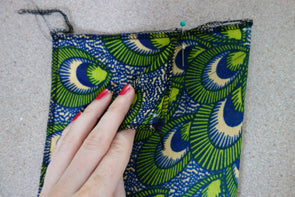 Baste pleats in place