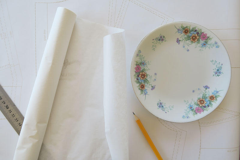 A plate is useful if you don't have a French curve