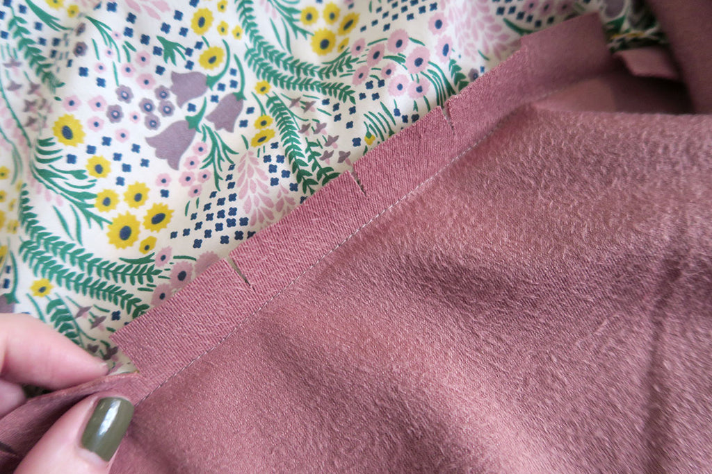 Press the seam onto the lining