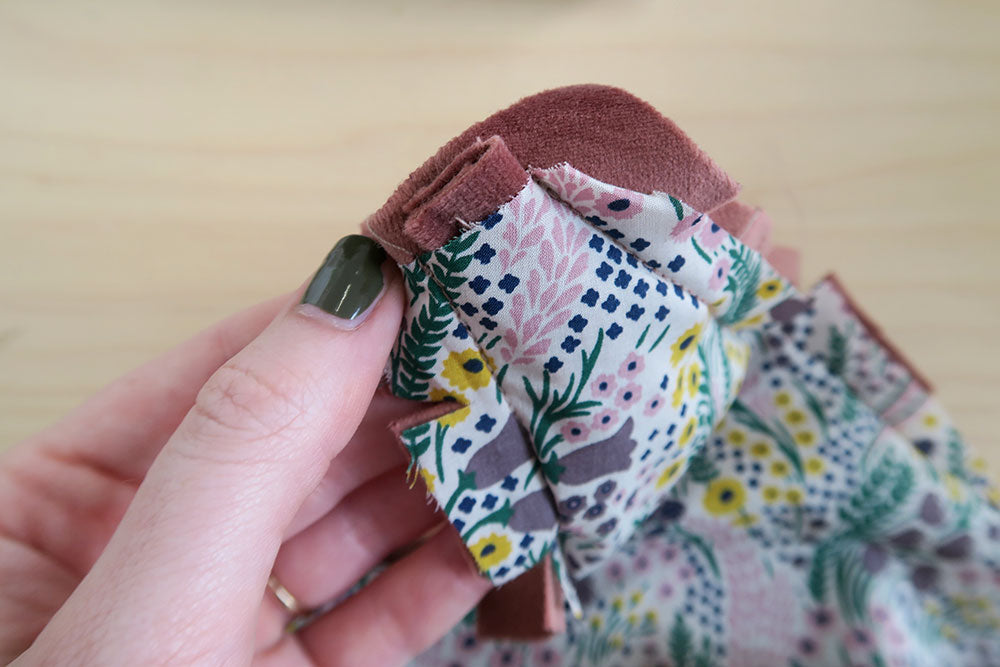 Slip the straps into the gap