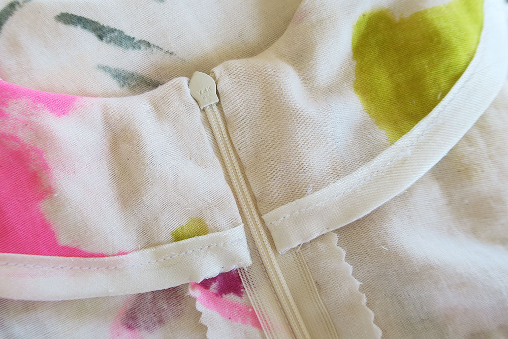 Slip stitch the facing in place