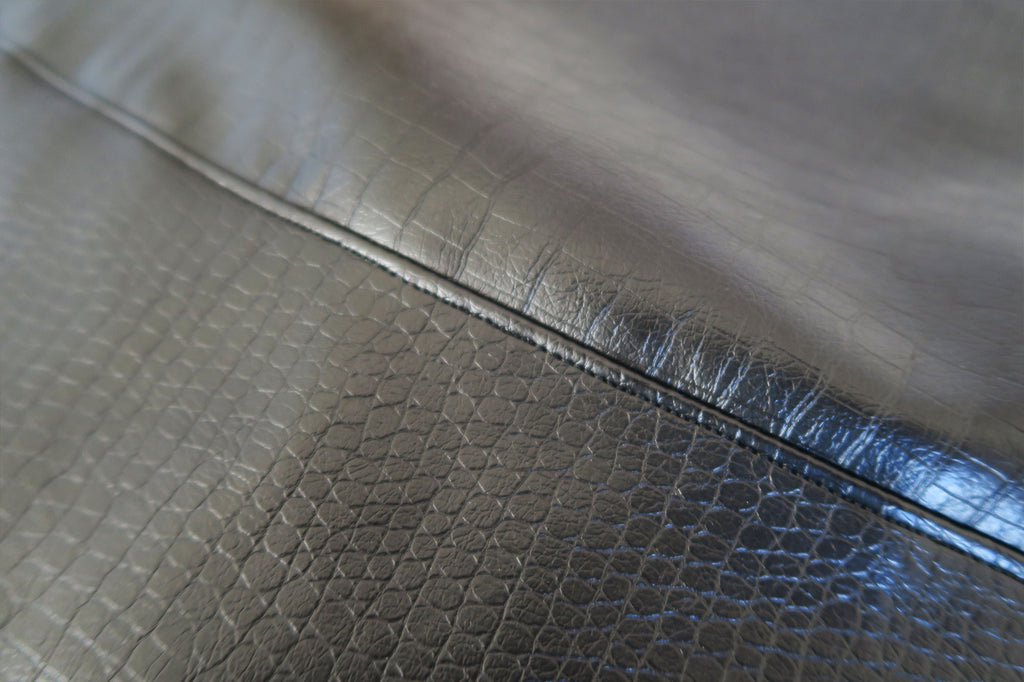 Top stitching on faux leather